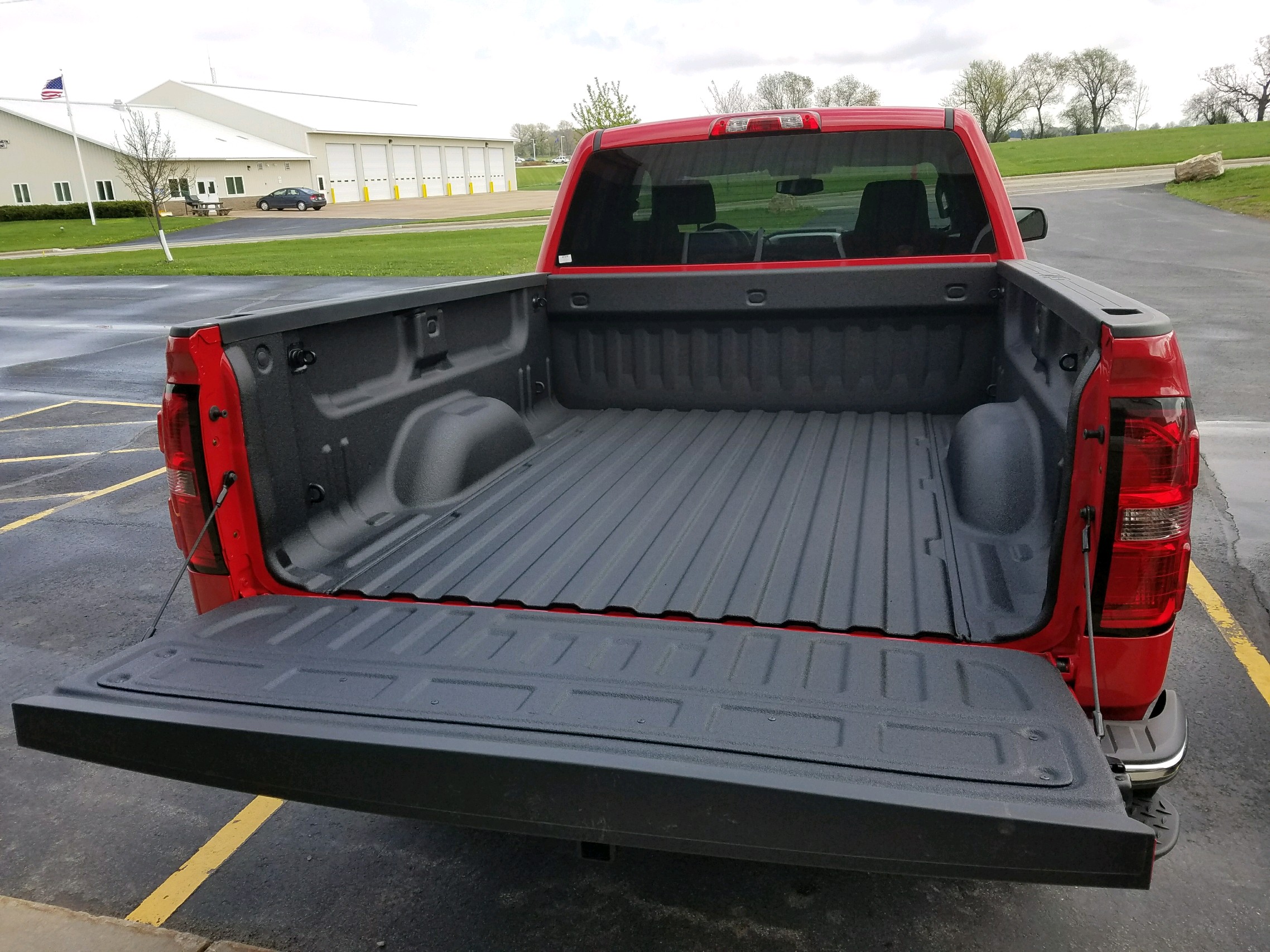 Vehicle undercarriage protected with sprayed polyurea