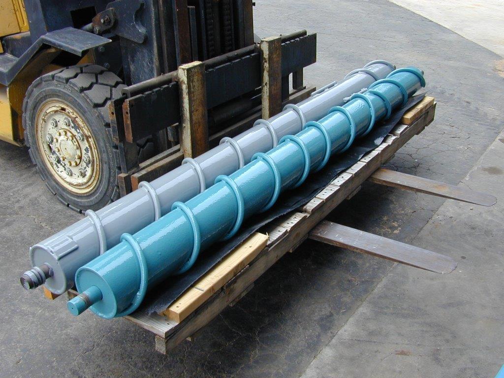 Farm implement coated to halt rust